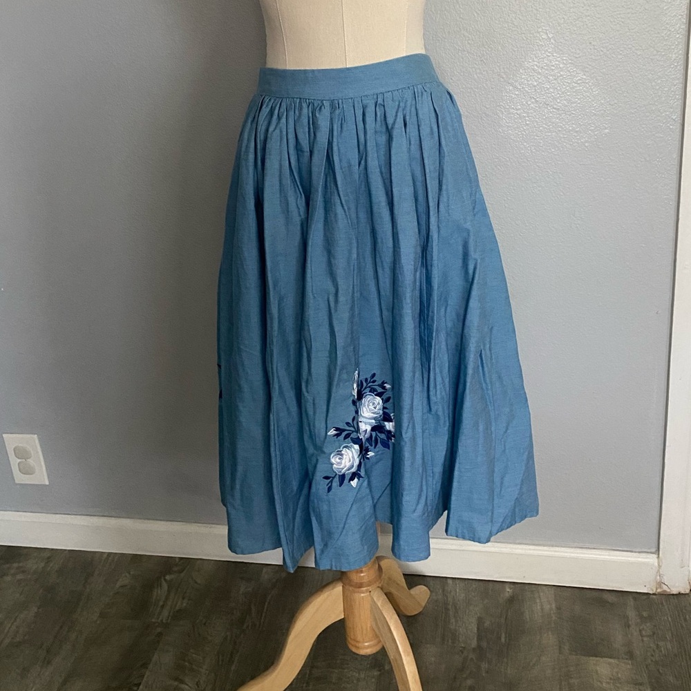 Collectif blue skirt with embroidered flowers